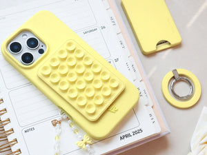 Yellow quilted phone case with diamond pattern texture and luxury finish