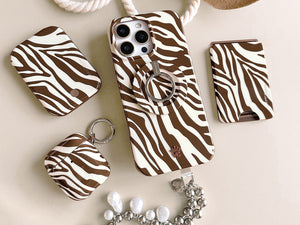 Zebra print phone case with black and white animal stripe pattern